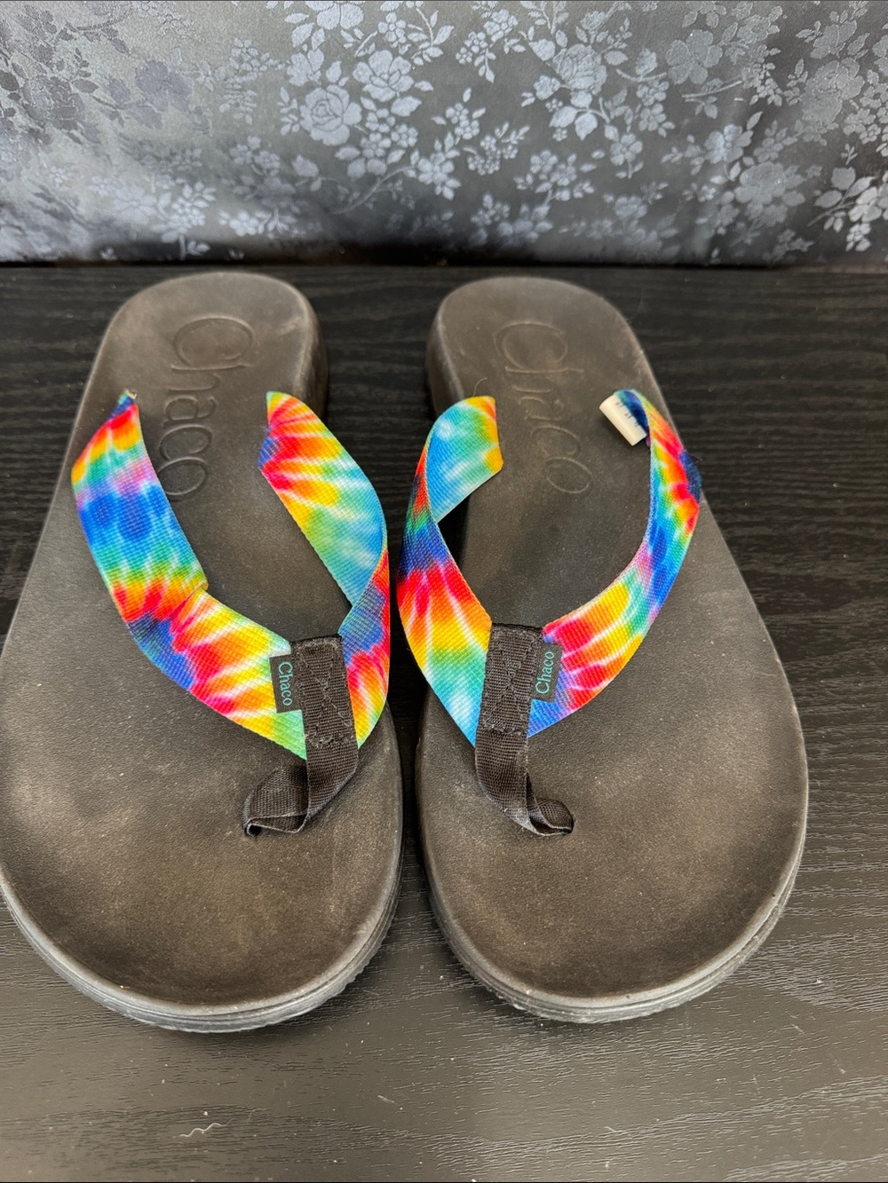 Chaco Kids black sandals with rainbow tie-dye straps